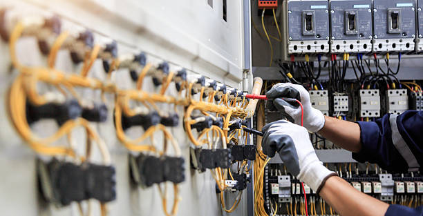 Professional Electrician technician working in Russellville, AL